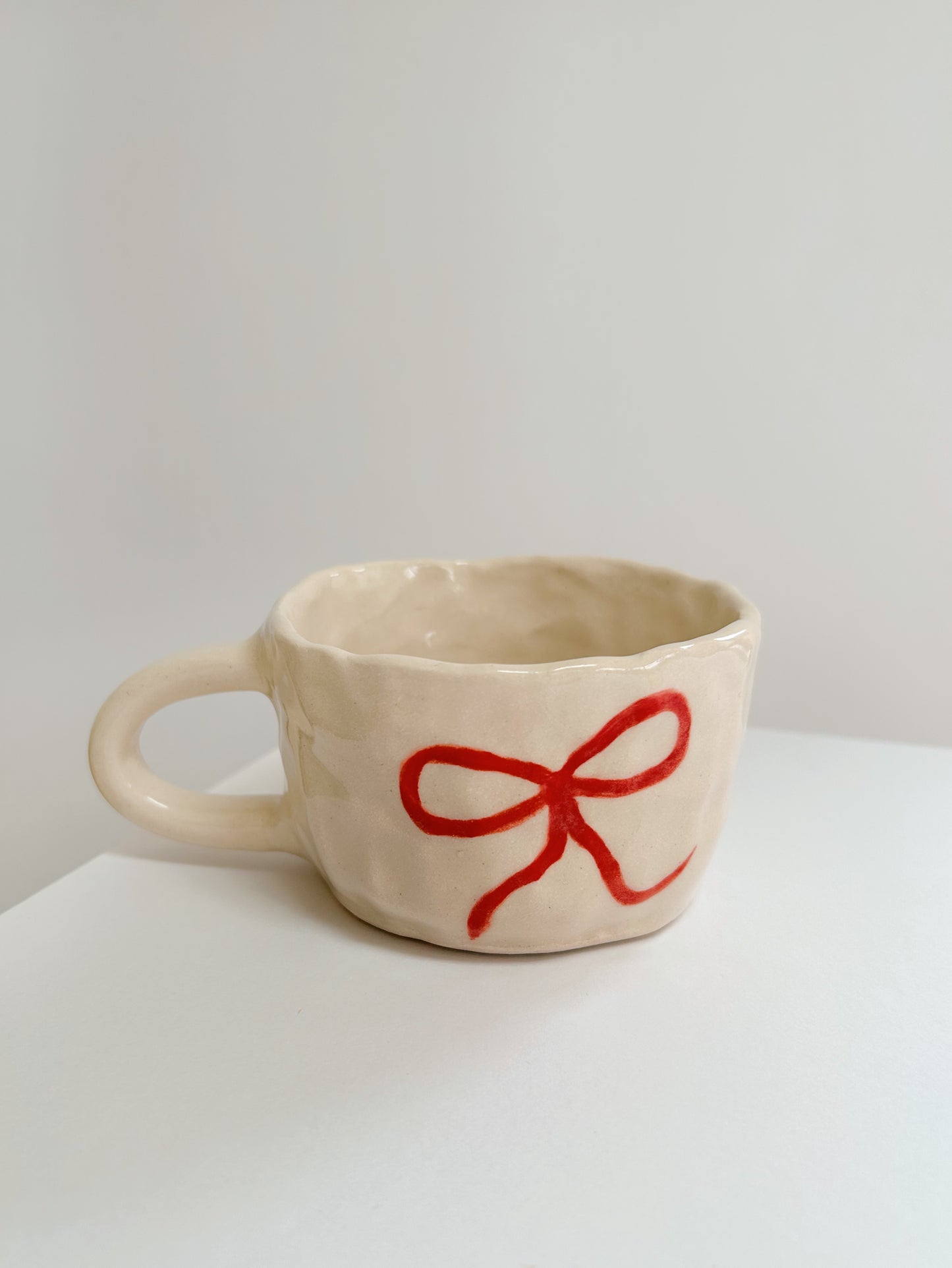 Ribbon Bow Handpinched Mug